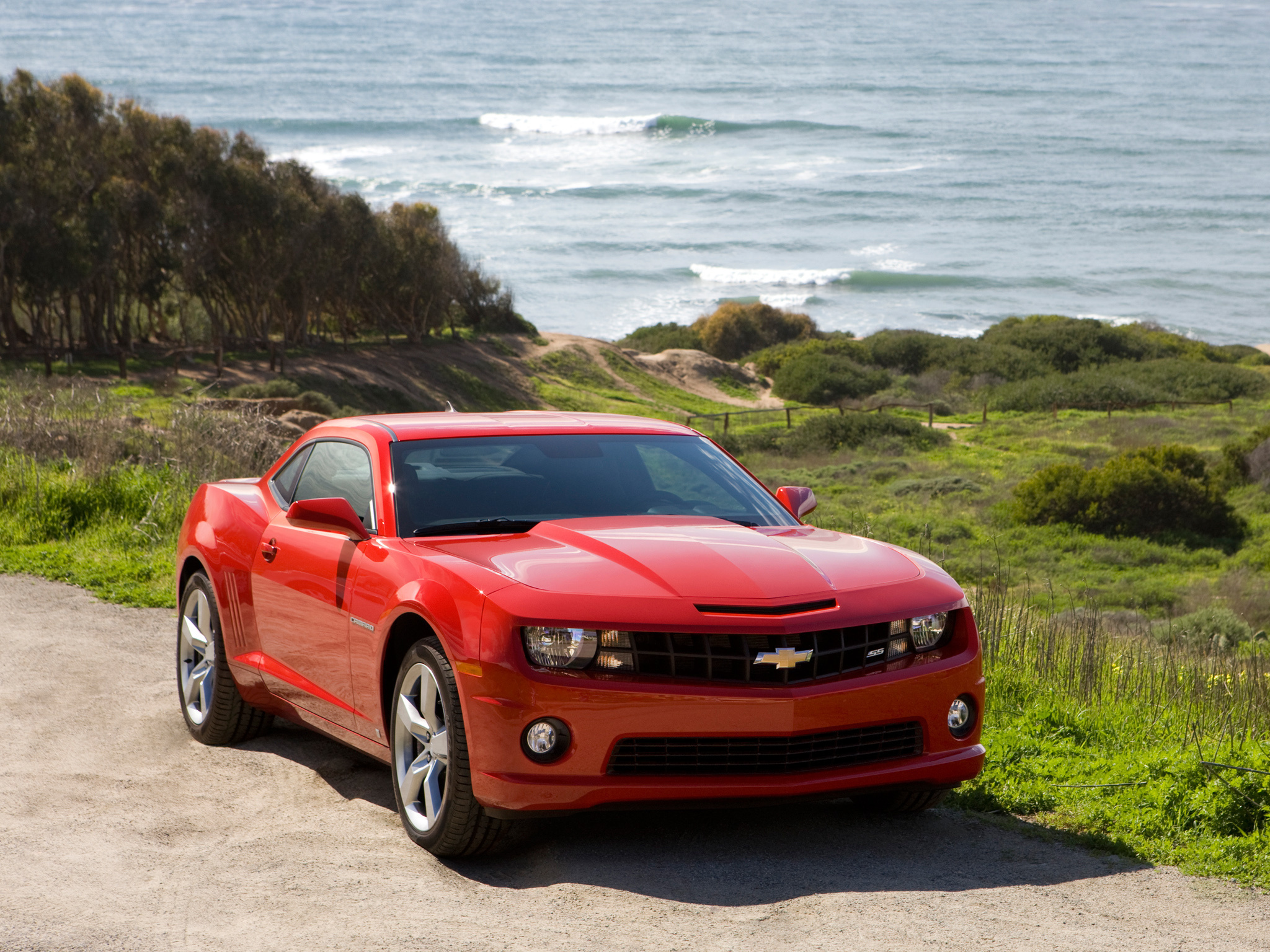 Машины машины друзья 2. Шевроле Камаро. Шиврвлет Камара красный. Chevrolet Camaro SS 2009. Chevrolet Camaro красная.