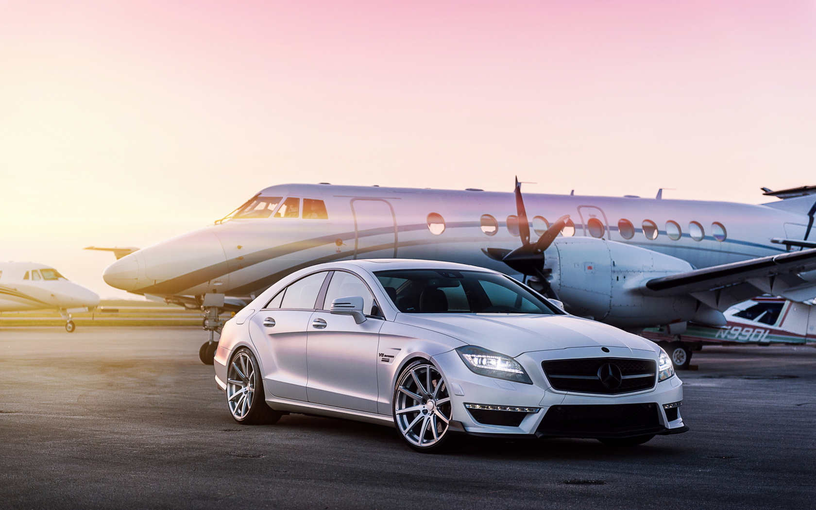 Private Jet and Mercedes