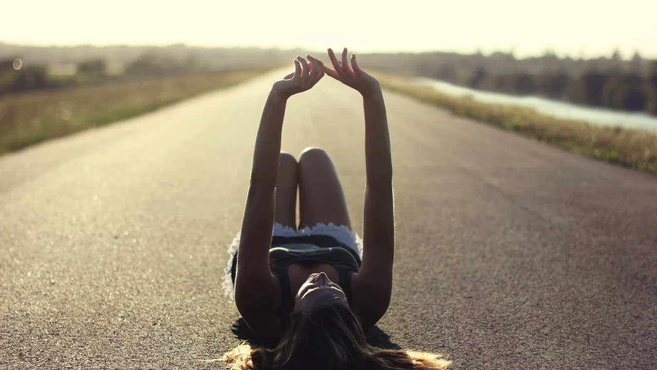 girl, lying aspahalt