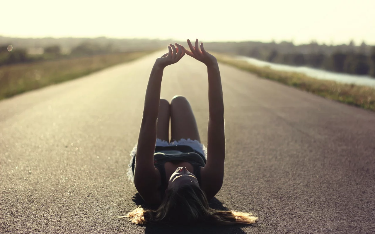 girl, lying aspahalt