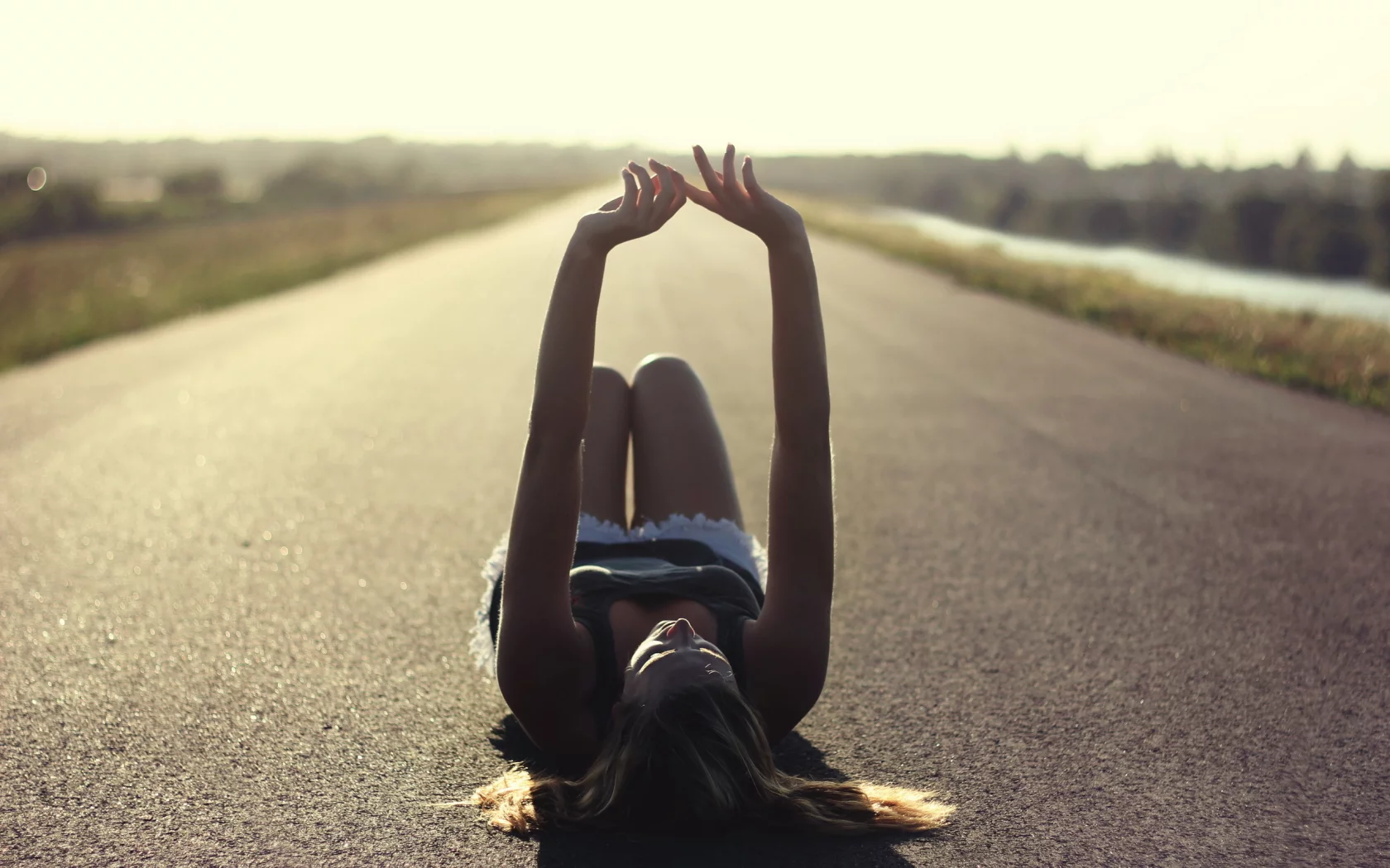 girl, lying aspahalt