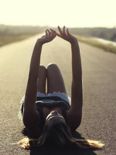 girl, lying aspahalt