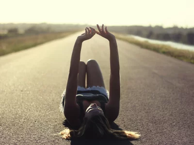 girl, lying aspahalt