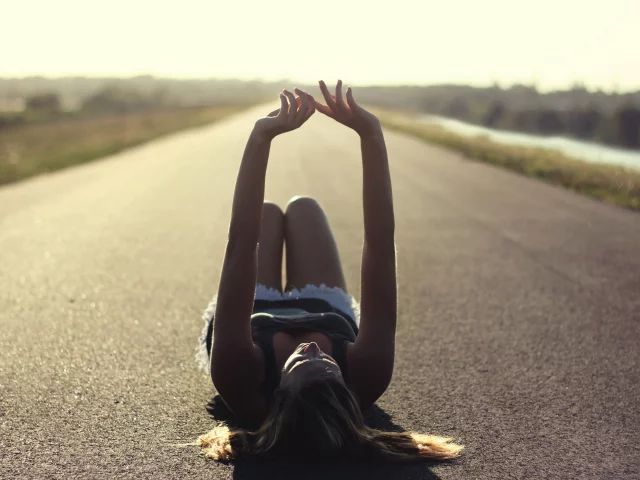 girl, lying aspahalt