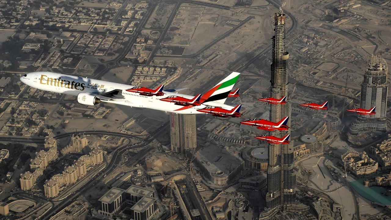Aircraft above skyscrapers in Dubai