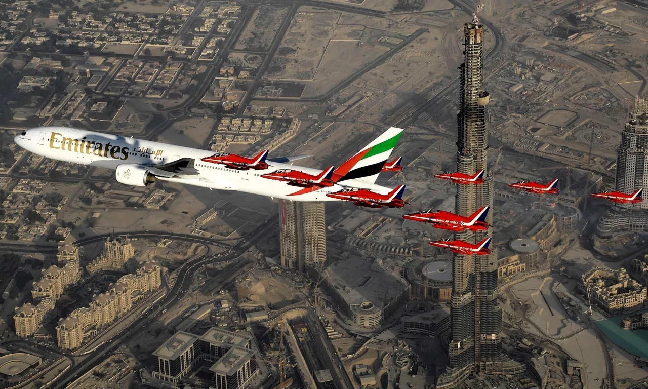 Aircraft above skyscrapers in Dubai