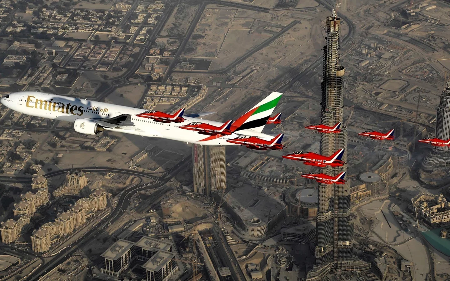 Aircraft above skyscrapers in Dubai