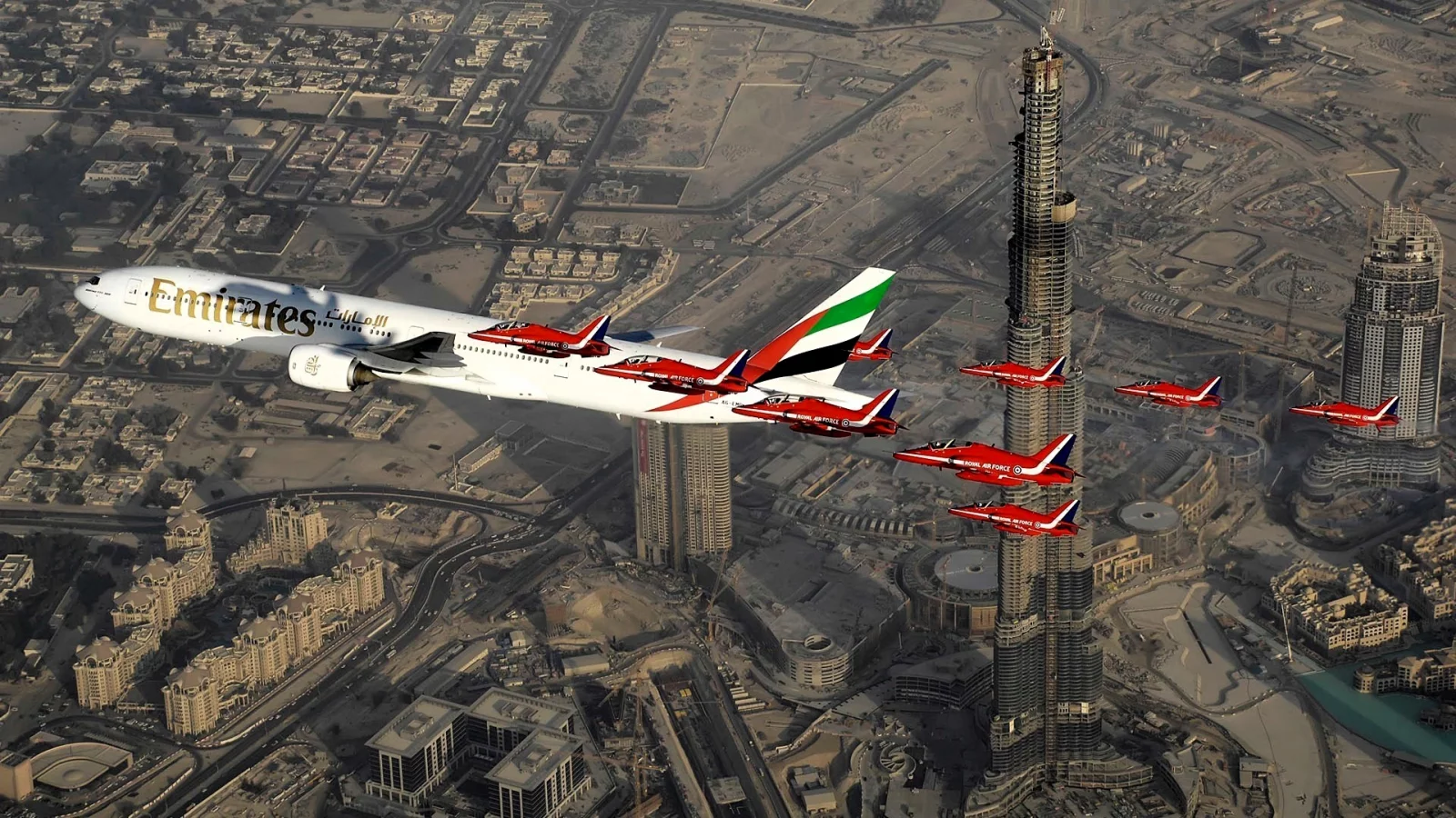Aircraft above skyscrapers in Dubai