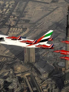 Aircraft above skyscrapers in Dubai